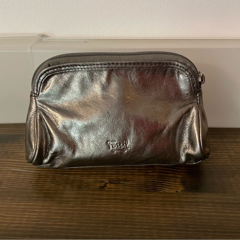 Fossil bag could be used as makeup bag, coin purse, organization etc.